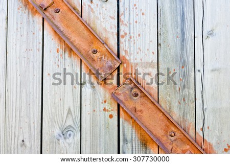 Old wood vintage background with steel plate, stone and old paint