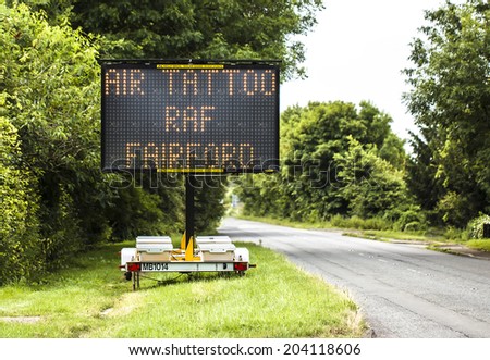 FAIRFORD, UNITED KINGDOM, JULY 08: Sign for Air Tattoo at the  Royal International Air Tattoo JULY 08 2014 in Fairford.