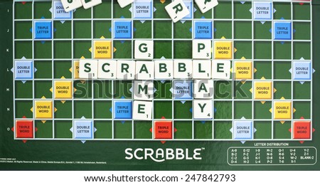 SWINDON, UK - JANUARY 28, 2015: Scrabble Word Game showing the playing board, Scrabble is made by Mattle