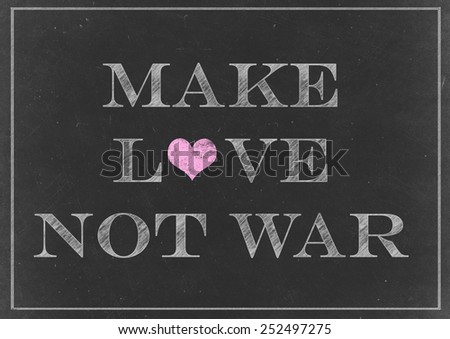 Chalk drawing - make love not war - anti-war slogan commonly associated with the American counterculture of the 1960\'s