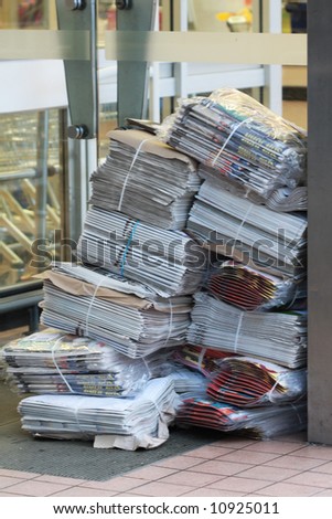 News Papers in doorway of shop