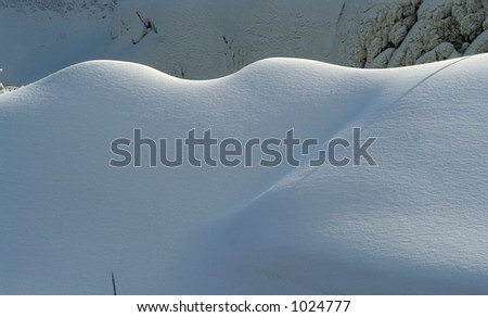 Winter snow hills or mounds of snow and ice