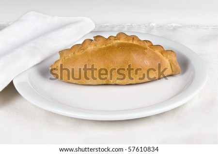 Traditional russian cabbage stuffed pastry on plate