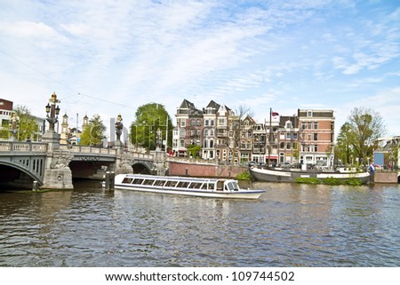 Sightseeing in Amsterdam the Netherlands on the river Amstel