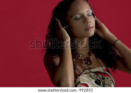 pretty girl listening to music in her headphones