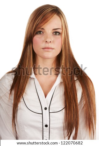 Beautiful young caucasian adult woman with long auburn red hair on a plain background, wearing a white button shirt.