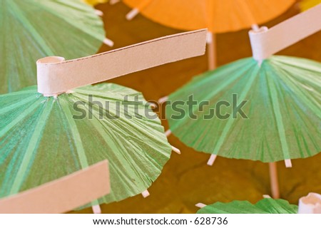 Table settings on cocktail umbrellas - copy space, shallow deth of field -