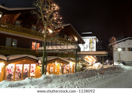 Restaurant and streets in Kirchberg, Germany.  Movement on people sitting in the restaurtant