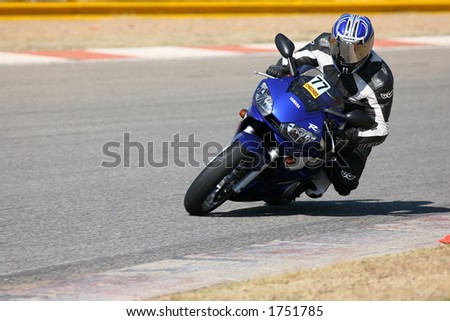 High speed Superbike on the circuit â€“ Kyalami, South Africa â€“ Movement on elements of the image. Trackday Editorial