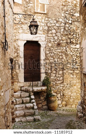 Buildings with windows and doors in the quaint little French hilltop village of Saint-Paul de Vence, Southern France,  Alpes Maritimes, next to the Mediterranean sea