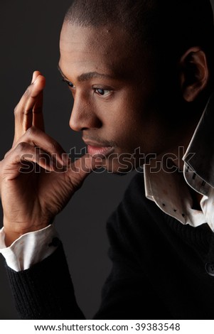 Young black african businessman in a formal suite - high contrast
