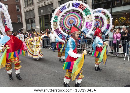 NEW YORK, NY - MAY 18: Members of Mazarte Dance Group dances on Broadway during 7th Dance Parade of New York on May 18, 2013 in New York City.