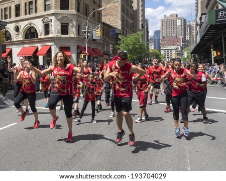 New York, NY, USA - May 17, 2014: Members of Vaydras Dance Fusion, zumba dance group perform at The 8th Annual New York City Dance Parade and Festival