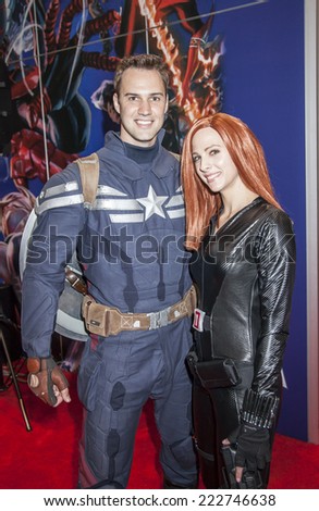 New York, NY, USA - October 10 2014: Comic Con attendees posing in the costume during Comic Con 2014 at The Jacob K. Javits Convention Center in New York City