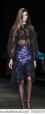 New York, NY, USA - February 13, 2015: A model walks runway for Monique Lhuillier Fall 2015 Runway show during Mercedes-Benz Fashion Week New York at the Theatre at Lincoln Center, Manhattan