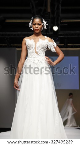 New York, NY, USA - October 11, 2015: A model walks runway for Israel Bridal couturier Solo Merav 2016 Bridal Collection during New York International Bridal Week at the Fashion Theater, Pier 94.