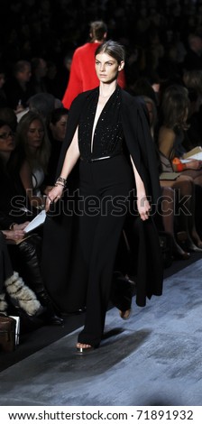 NEW YORK - FEBRUARY 16: A model walks the runway for collection by Michael Kors at Mercedes-Benz Fall/Winter 2011 Fashion Week on February 16, 2011 in New York City.