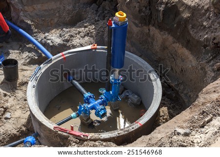 The construction of a municipal water supply tap being built