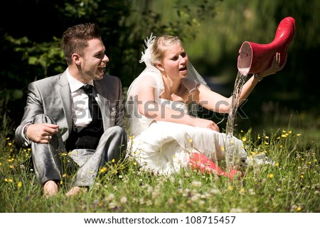 bride and groom in the nature trash the dress