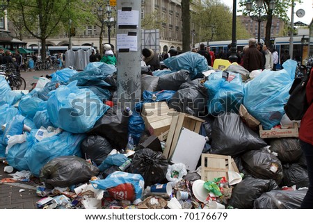 AMSTERDAM, THE NETHERLANDS - MAY 15: Garbage piled up during the week long workers strike that ended today. May 15, 2010, in Amsterdam, The Natherlands
