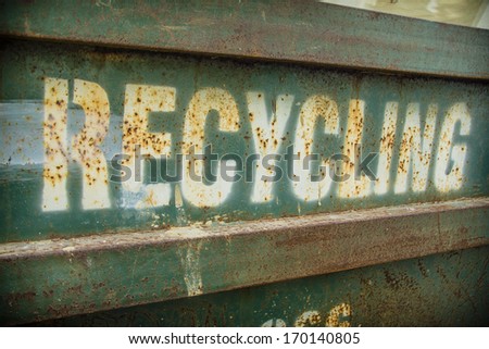 Grungy recycling sign