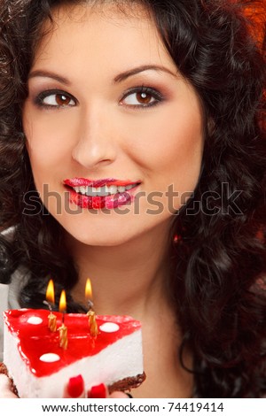 pretty woman with cake make a wish