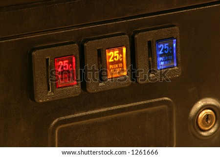 Lighted coin slots of an arcade game machine