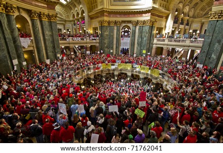 MADISON, WI - FEBRUARY 18: Jesse Jackson speaks to thousands of union protesters opposing Governor Scott Walker\'s new budget bill at the Wisconsin Capitol on February 18, 2011 in Madison, Wisconsin.