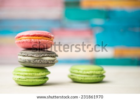 French macarons vertical on colorful background/French macarons/Macarons french dessert