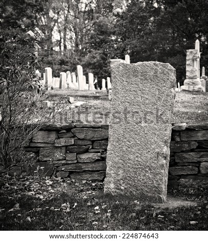 Old cemetary in fall in black and white