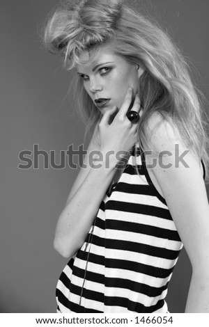 Model with a make-up. It is black a white photo. Style from Elle Nova. Fashion.