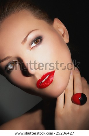 Evening make up.Girl with very beautiful evening make-up, red, bright lipstick. Glamour lady, studio shot