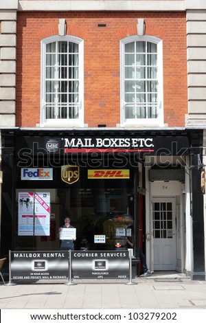 LONDON - MAY 16: Mail Boxes Etc store on May 16, 2012 in London. Mail Boxes Etc is a global chain of delivery services including major couriers (DHL, UPS, Fedex) in the UK. It has 100 stores in the UK