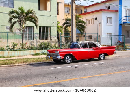 HAVANA - FEBRUARY 24: Classic Ford car on February 24, 2011 in Havana. Recent change in law allows the Cubans to trade cars again. Old law resulted in very old fleet of private owned cars in Cuba.