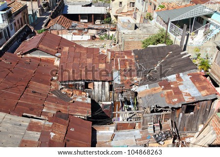 Slums area - poor buildings in Santiago de Cuba