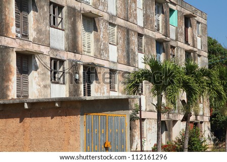 Poor dirty apartment building in Matanzas, Cuba. Communist concrete architecture.