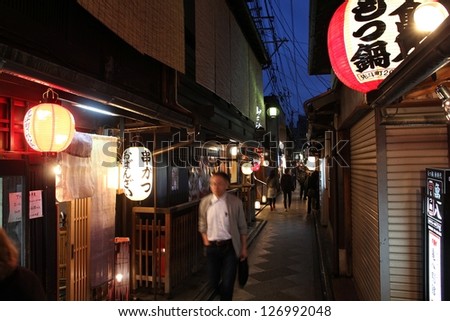 KYOTO, JAPAN - APRIL 16: Tourists visit Pontocho street on April 16, 2012 in Kyoto, Japan. According to TripAdvisor, best restaurants in Kyoto are located in Pontocho.