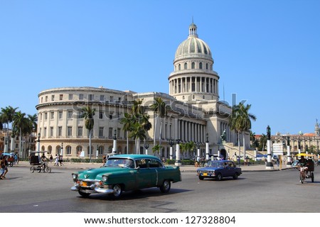 HAVANA - FEBRUARY 26: Cubans drive Classic American cars on February 26, 2011 in Havana, Cuba. Recent change in law allows the Cubans to trade cars after it was forbidden for many years.