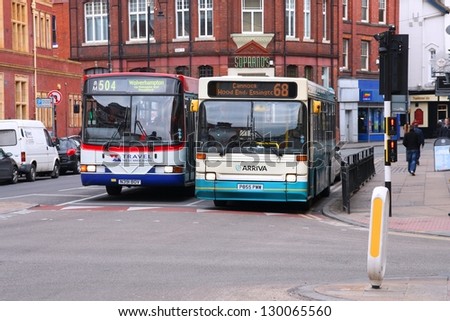 WOLVERHAMPTON, UK - MARCH 10: People ride National Express (TWM) and Arriva bus on March 10, 2010 in Wolverhampton, UK. The 2 companies are direct competitors in the UK.