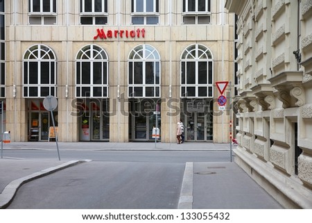 VIENNA - SEPTEMBER 9: People walk by Marriott hotel on September 9, 2011 in Vienna. Marriott International has 3,800 properties in 74 countries and had 12.31 billion USD revenue in 2011.