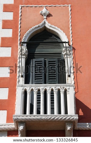Old window in Venice, Italy. Vintage architecture. Venetian palace style. UNESCO World Heritage Site.