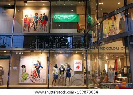 NAGOYA, JAPAN - MAY 3: People visit United Colors of Benetton fashion store on May 3, 2012 in Nagoya, Japan. Benetton is a global luxury fashion brand with 6400 stores in 120 countries.