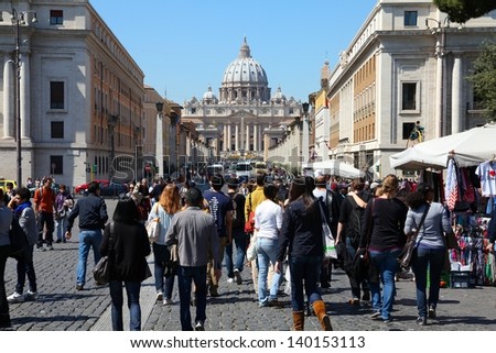 ROME - APRIL 10: Tourists walk towards Vatican on April 10, 2012 in Rome. According to Euromonitor, Rome is the 3rd most visited city in Europe (5.5m international tourist arrivals 2009)