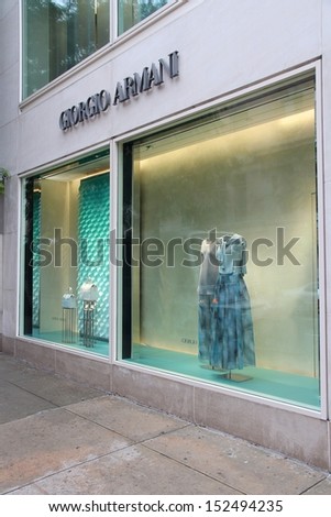 NEW YORK - JULY 1: Giorgio Armani fashion store on July 1, 2013 in Madison Avenue, New York. The famous fashion company had 1.8 billion EUR worldwide revenue in 2011.
