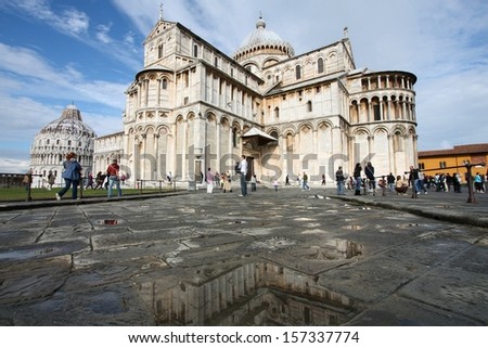 PISA, ITALY - OCTOBER 22: People visit the cathedral on October 22, 2009 in Pisa, Italy. Duomo square is a UNESCO Site and Italy is the 5th most visited country in the world (46 million in 2012).