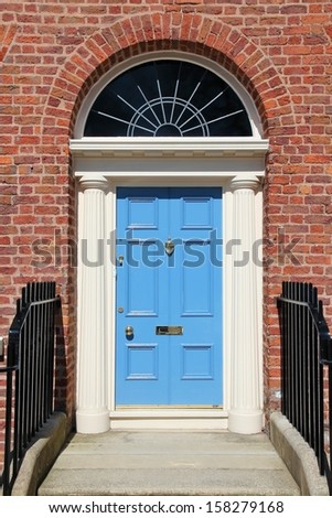 Liverpool - city in Merseyside county of North West England (UK). Old blue door, Georgian architecture style.