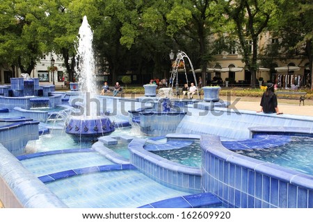 SUBOTICA, SERBIA - AUGUST 12: People visit art nouveau Blue Fountain on August 12, 2012 in Subotica, Serbia. Subotica has the most art nouveau monuments of all places in Serbia.