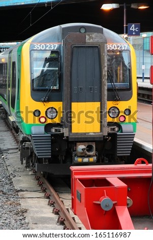 BIRMINGHAM, UK - APRIL 19: London Midland train on April 19, 2013 in Birmingham, UK. It is part of Go-Ahead group, international transport company with 23,563 employees (2013).
