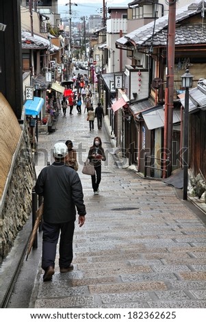 KYOTO, JAPAN - APRIL 14, 2012: People visit old town of Gion district, Kyoto, Japan. Old Kyoto is a UNESCO World Heritage site and was visited by almost 1 million foreign tourists in 2010.