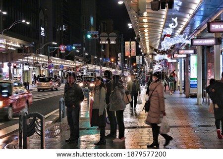 KYOTO, JAPAN - NOVEMBER 27, 2016: People shop at Shijo Dori in Kyoto, Japan. Kyoto is a major city with population of 1.5 million.